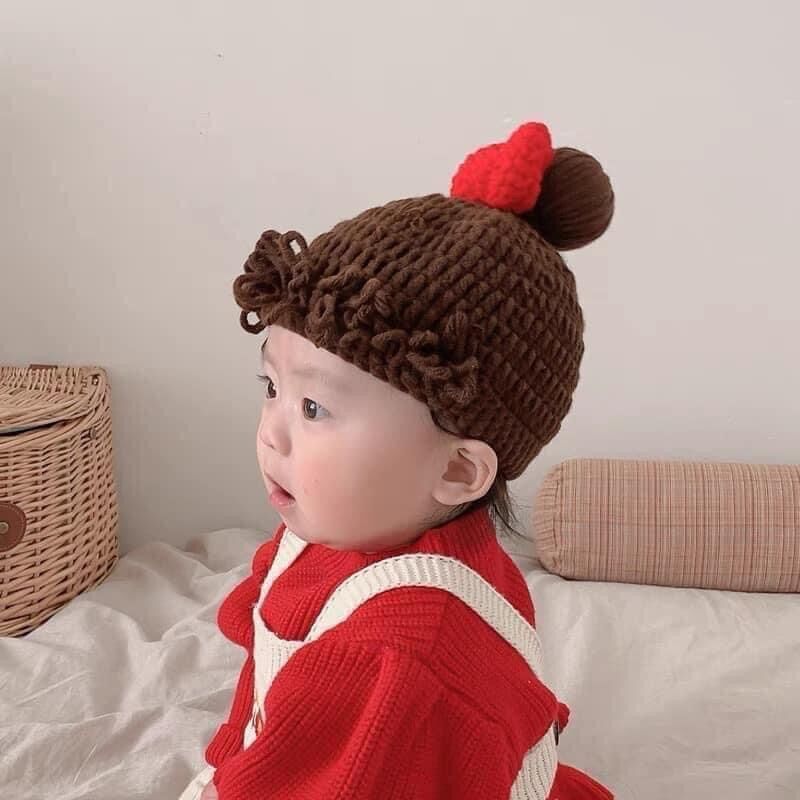 nón mái xù giả tóc búi nơ bé gái