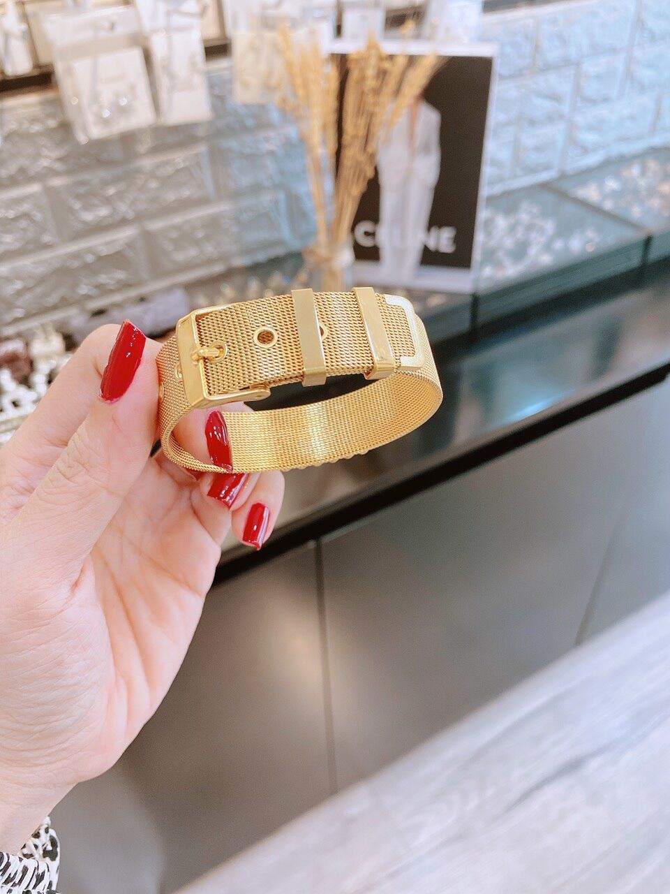 TTN7114 - Lắc tay titan bản lưới LV (màu vàng)