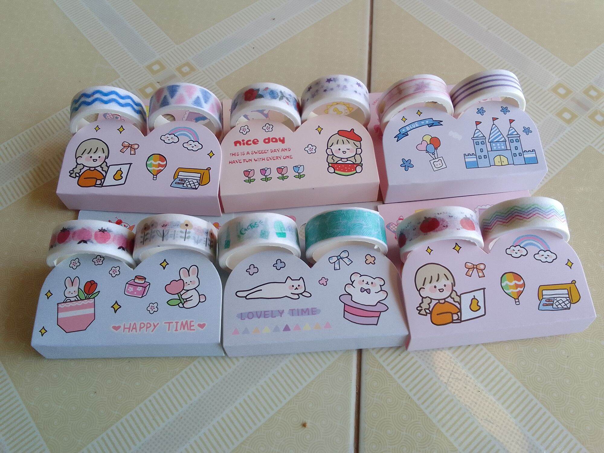 VỈ 2 CUỘN BĂNG KEO GIẤY HOẠ TIẾT DỄ THƯƠNG DÙNG TRANG TRÍ