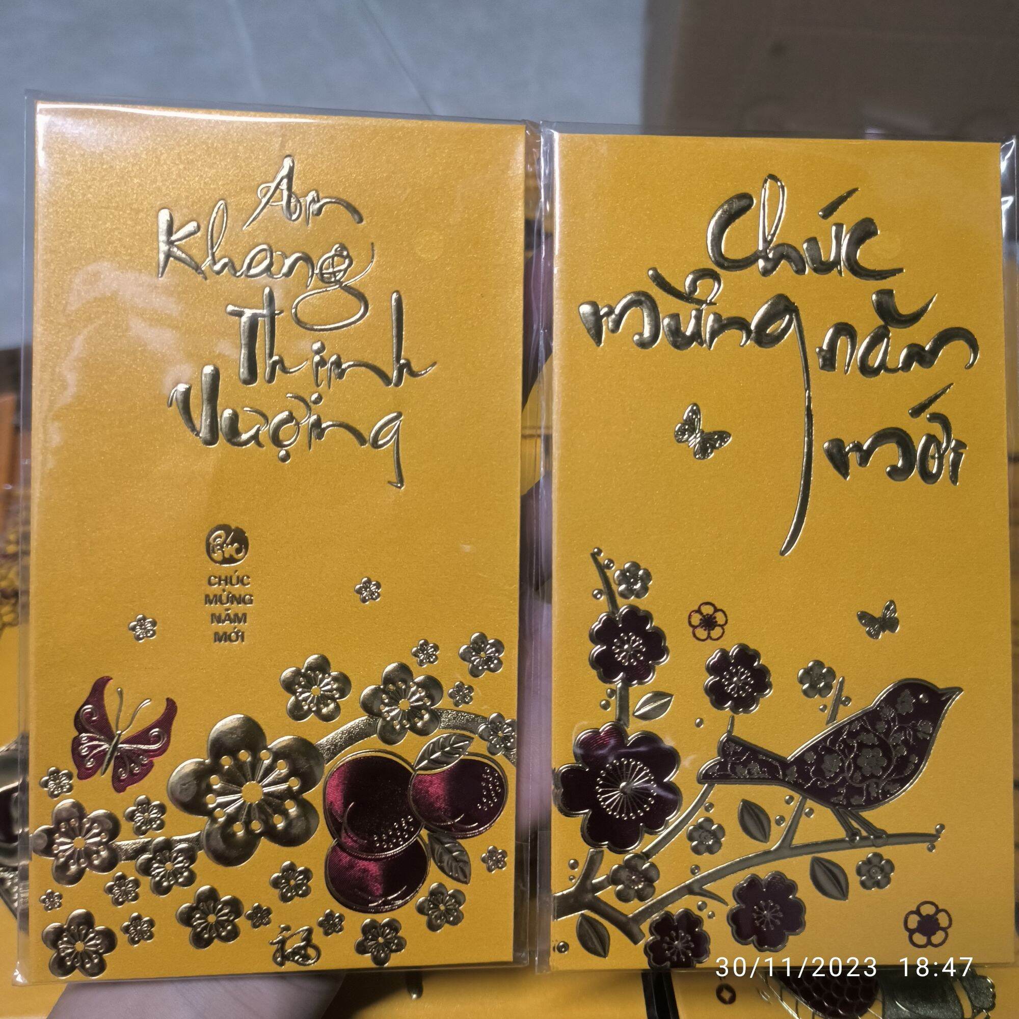 Combo 30 bao lì xì màu vàng in nhũ nổi