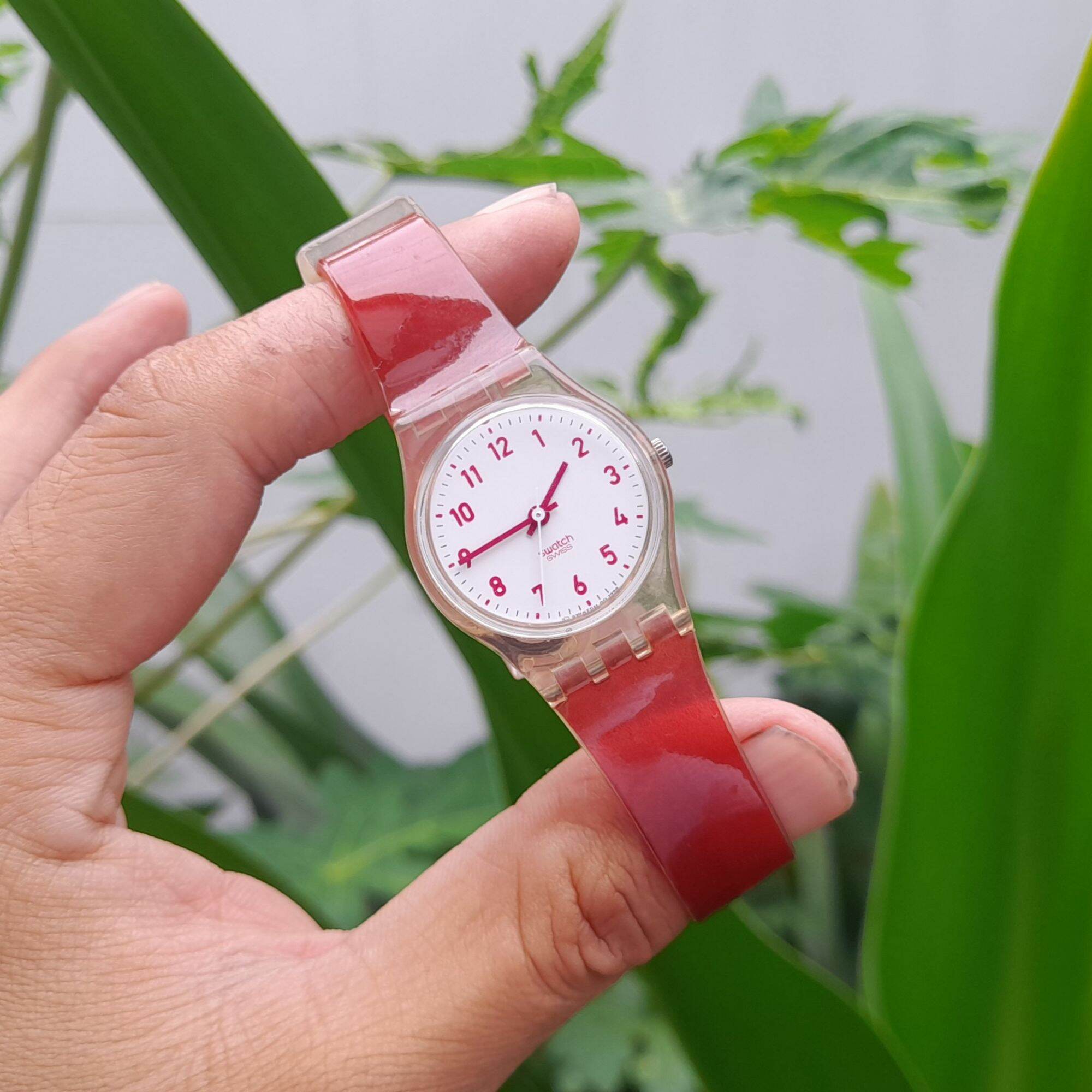 Đồng hồ Nữ Swatch Swiss mặt trắng dây đỏ số học trò