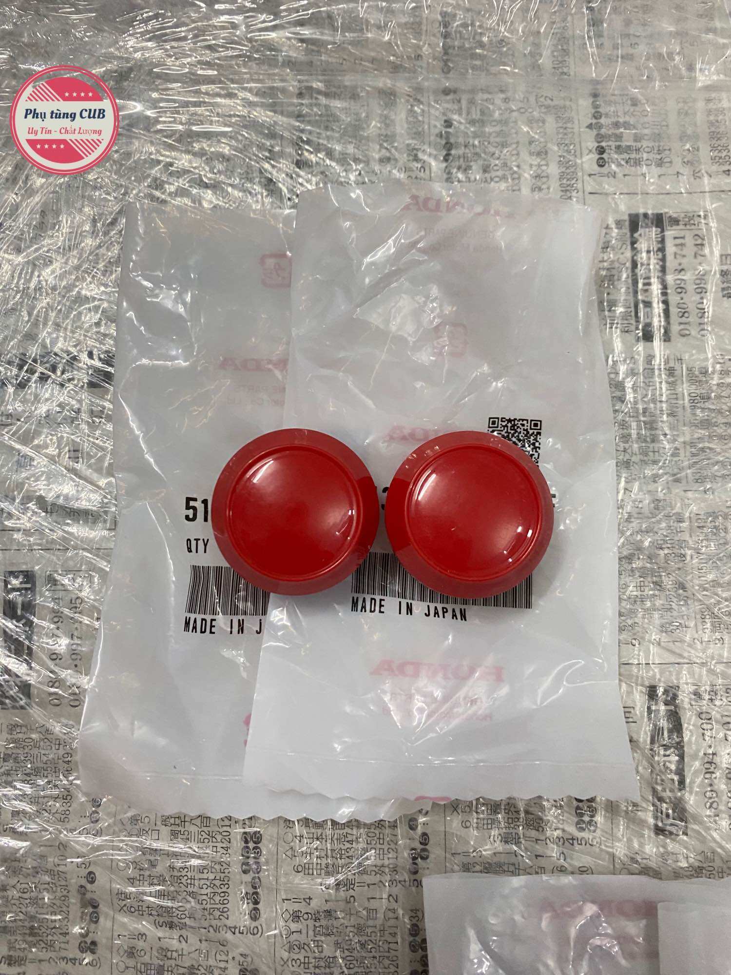 Nút chụp phuộc trước xe cub hàng zin mới ( giá 1 cặp )