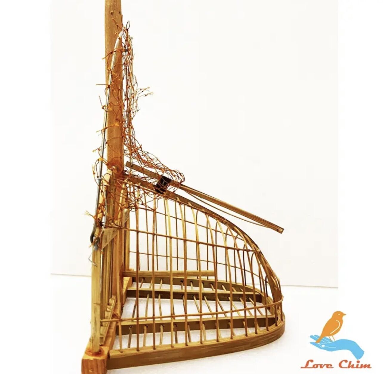 Lồng bẫy chim khuyên bằng trúc qua xử lý