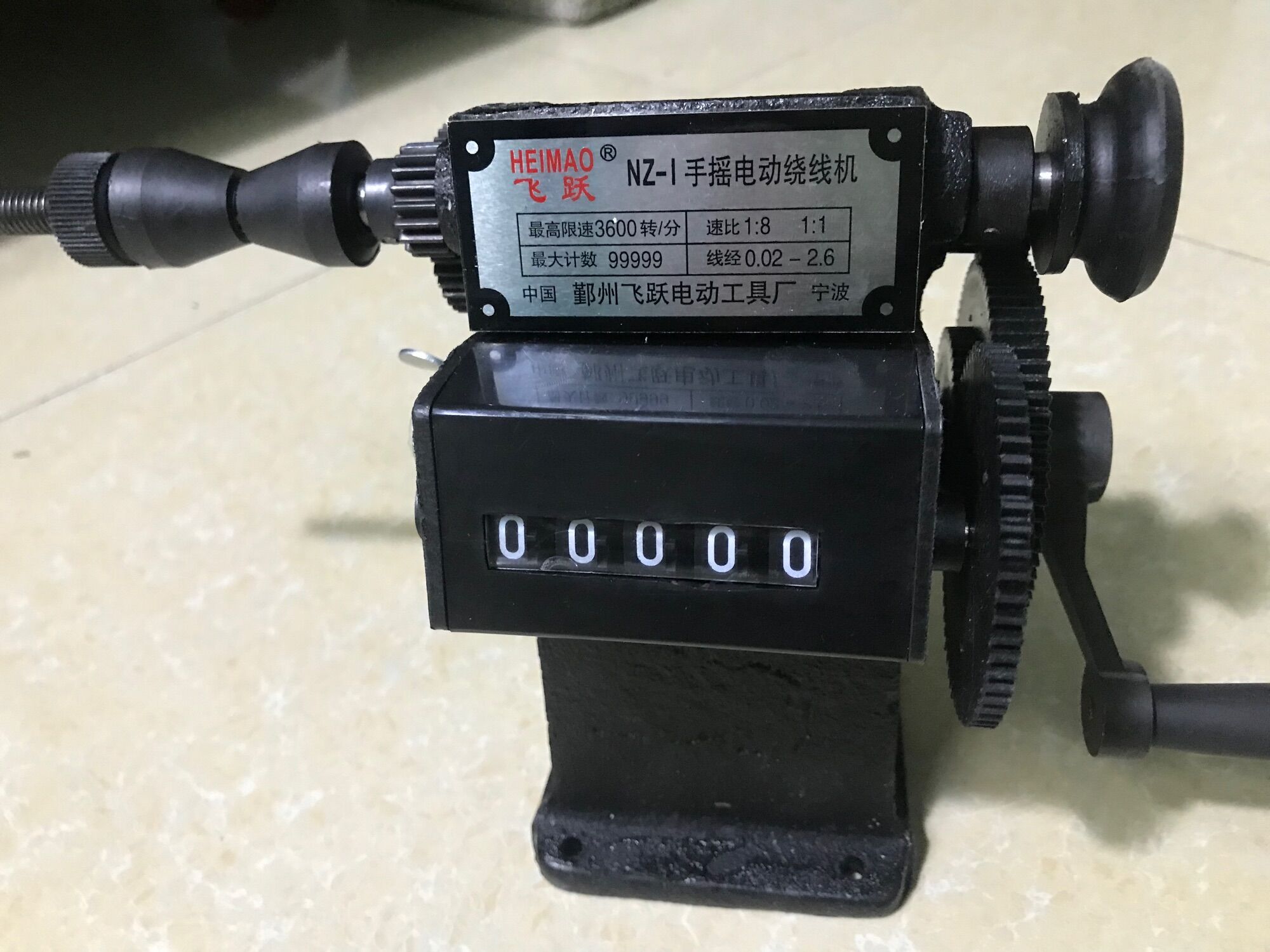 Máy quấn dây báo số tự động.