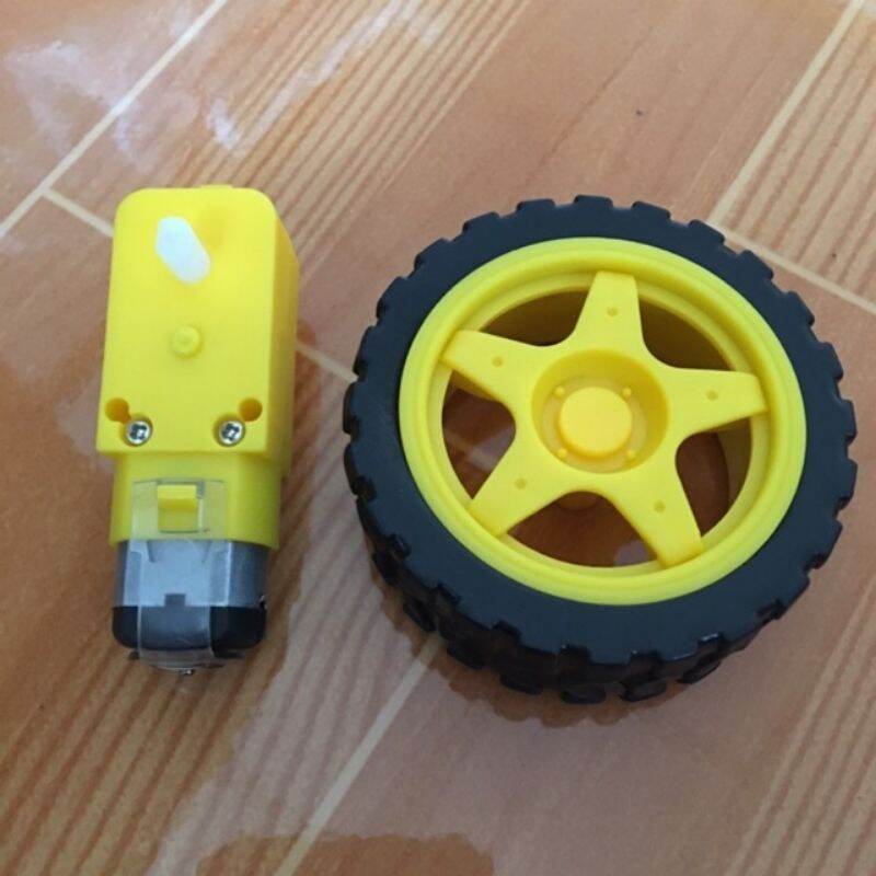 Động cơ giảm tốc vàng kèm bánh xe chế