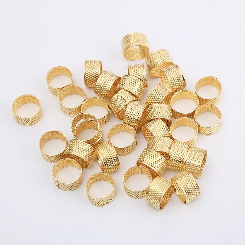 Nhẫn thêu và cây gỡ chỉ (thêu chữ thập)