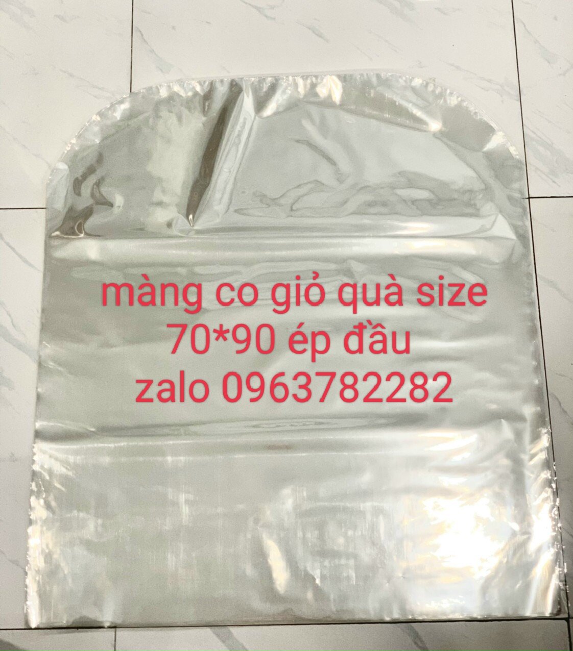 1kg màng co bọc quà size 60*80cm ép đầu