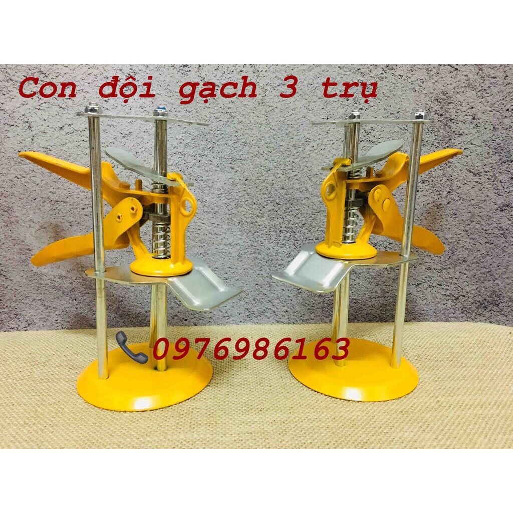 1 chiếc kích nâng gạch, con đội gạch 3 trụ hàng loại 1
