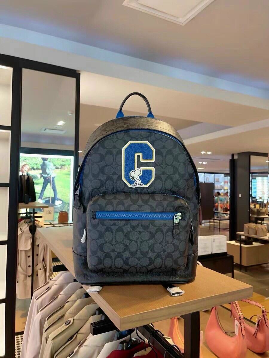 Ba lô Coach X Peanuts West Backpack In Signature Canvas With Snoopy da