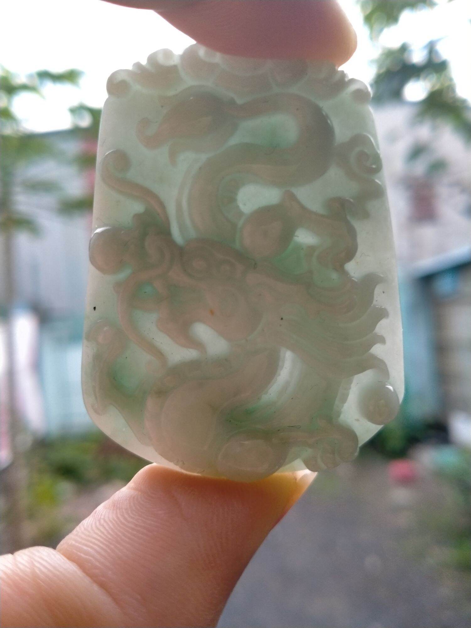 Mặt cẩm thạch chạm rồng