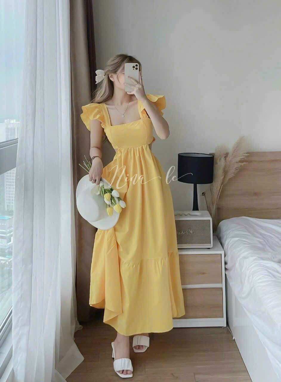 Đầm maxi khoét eo dây cột nơ lưng trẻ trung
