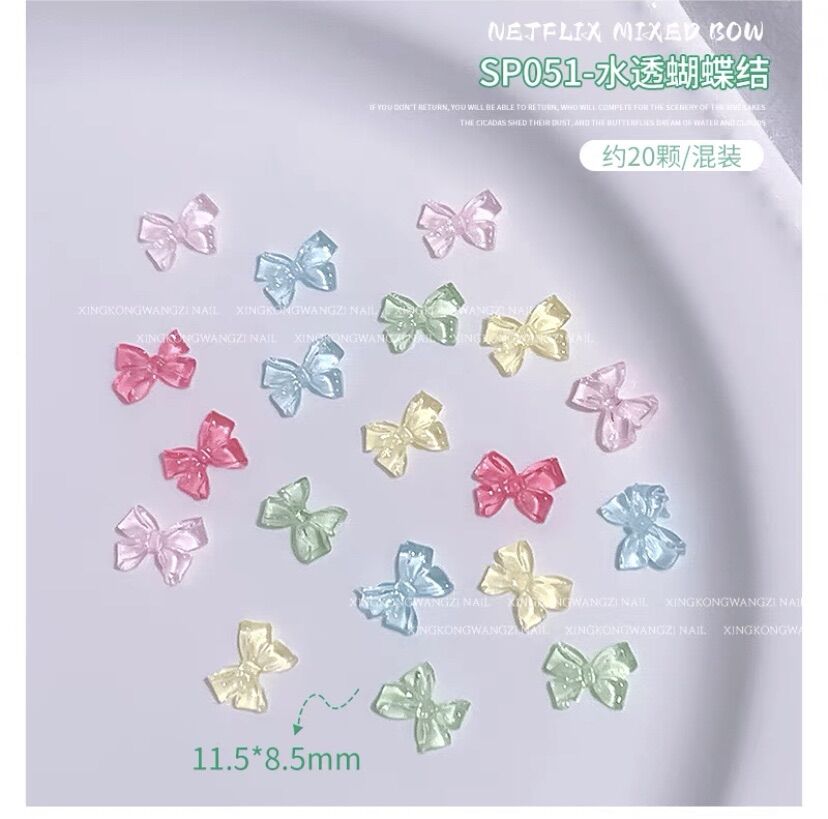 Nơ pha lê nail , set 50 cái phụ kiện gắn móng hình nơ