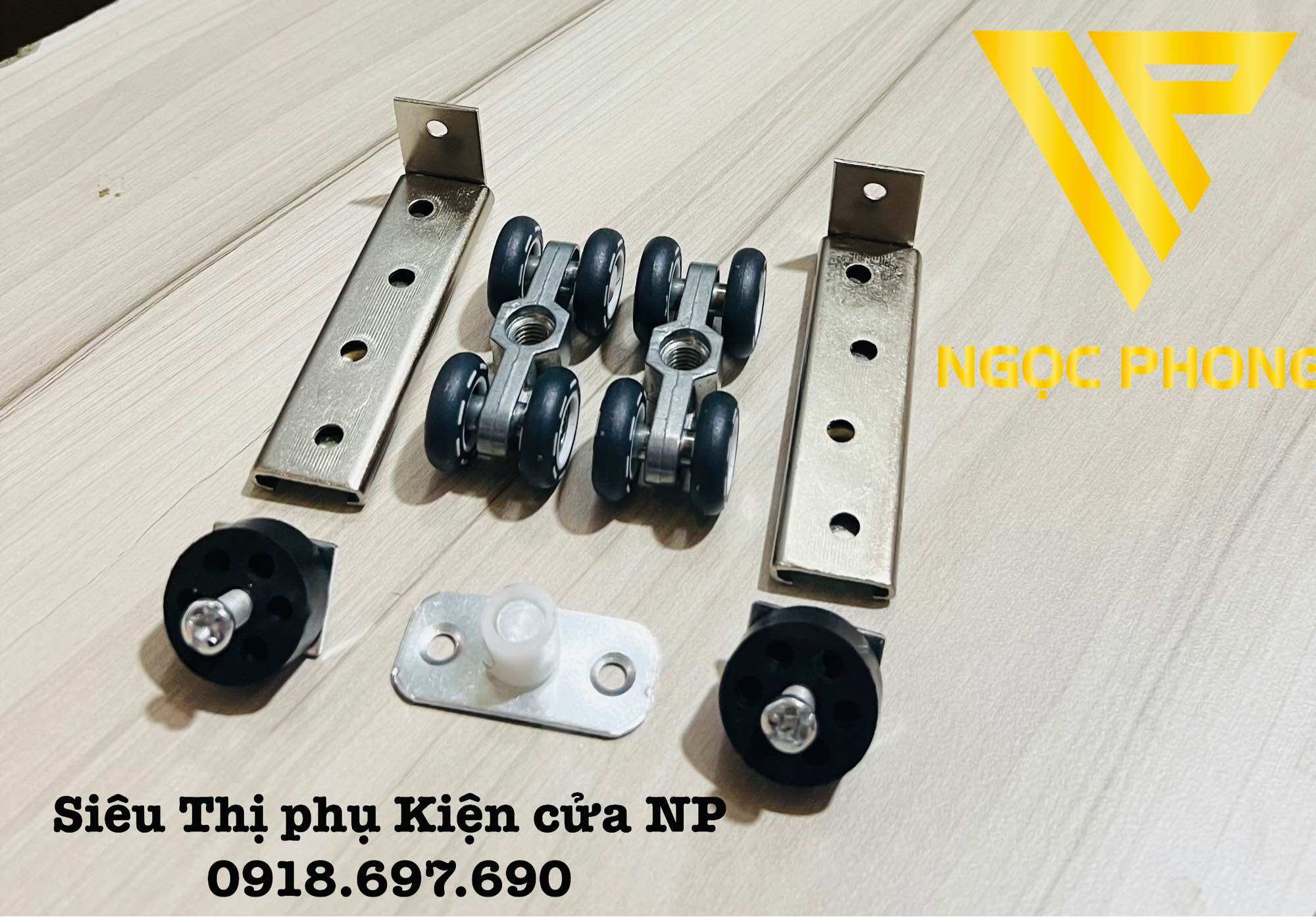 Bộ bánh xe treo cửa lùa nhôm - sắt -gỗ hộp tím