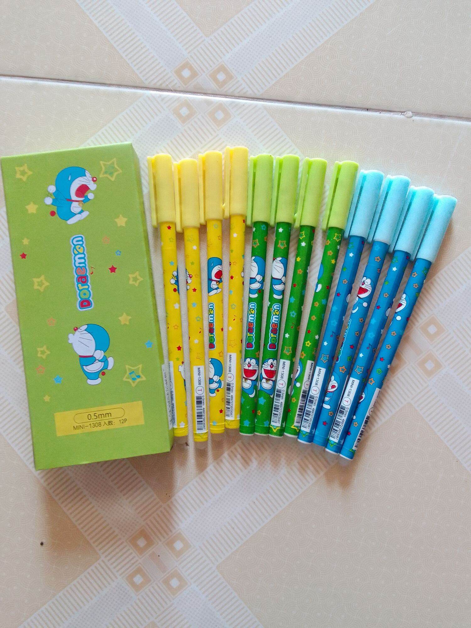 Hộp 12 bút mực gel xóa được đô rê mon mực tím dễ viết dễ xóa, mực ra đều đẹp