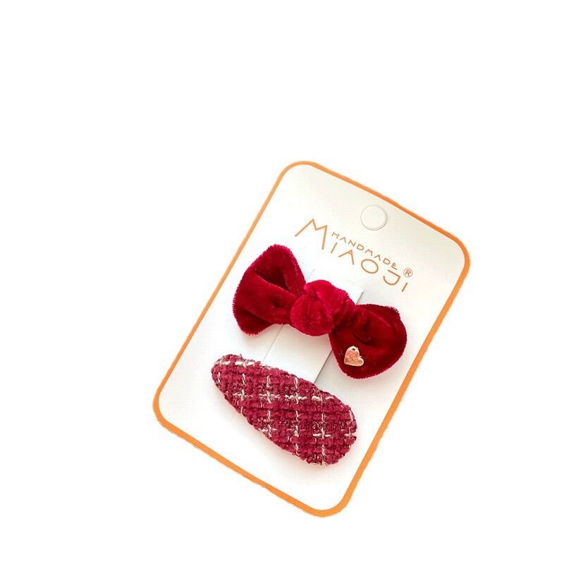 Set kẹp tóc màu đỏ lễ Tết cho bé gái