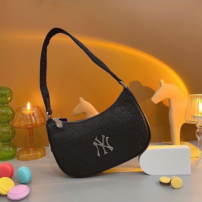 Túi kẹp nách M.L.B dập xuất dư