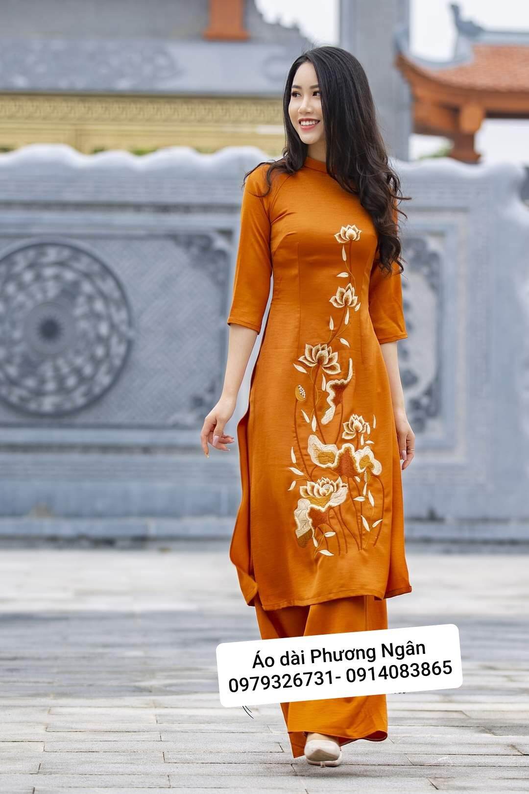 Bộ áo dài cách tân đi lễ chùa  chất liệu lụa tây thi cao cấp màu vàng( cổ 2 phân tay lỡ)