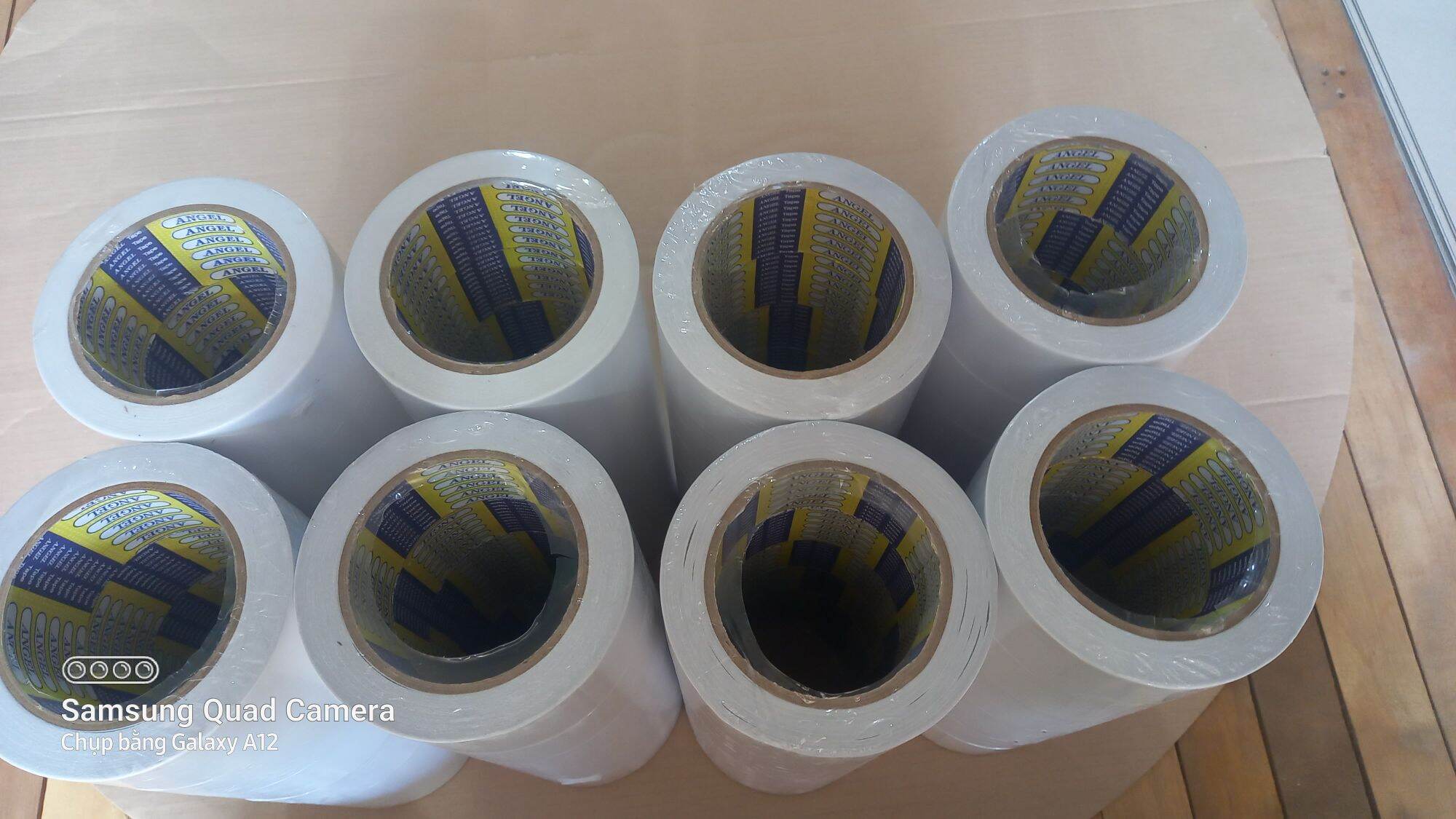Băng keo 2 mặt trắng dầu 48mm*23y lốc 6 cuộn