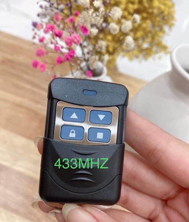 Tay điều khiển cửa cuốn học lệnh thông minh tần số 433mhz , 315mhz - remote cửa cuốn tần số 433mhz 315mhz