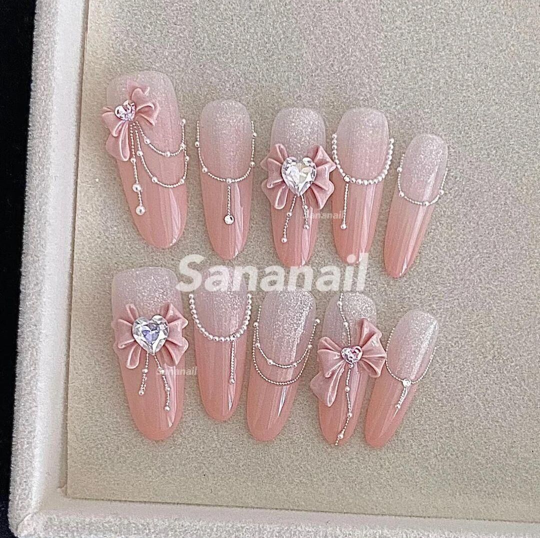Nailbox thiết kế , màu thạch mắt mèo,  nơ tiểu thư xinh  mã 50