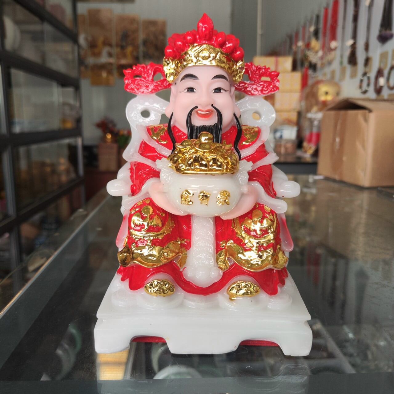 Tượng thần tiền đá đúc cao 20cm màu đỏ