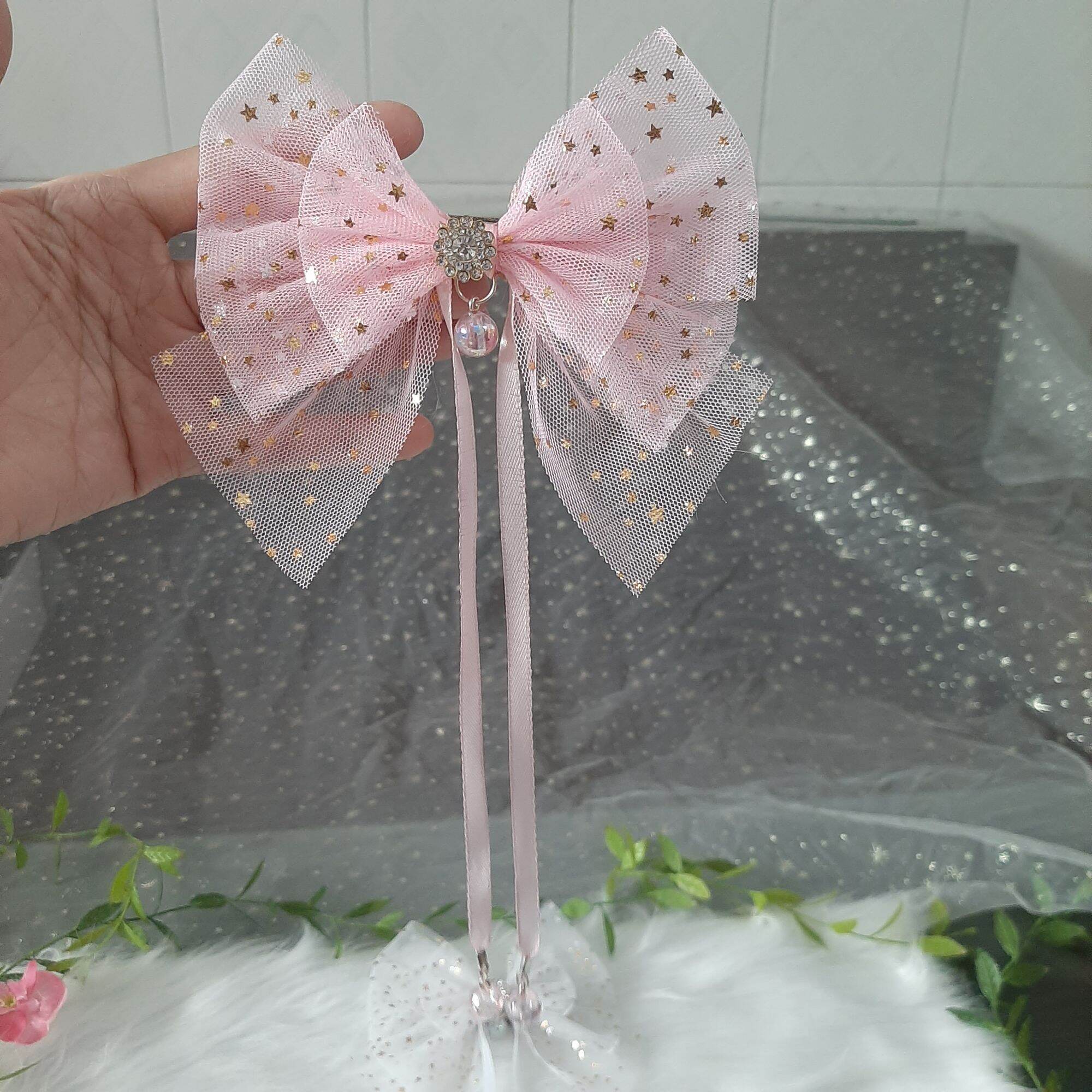 Kẹp tóc nơ lấp lánh đính sao