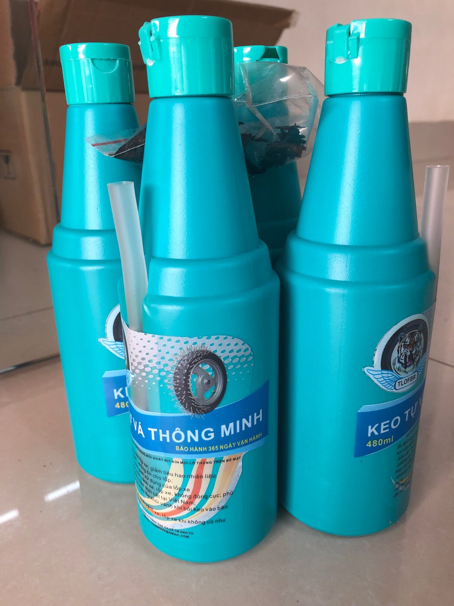 4 chai keo vá lốp không săm Anh Tú chai 480ml
