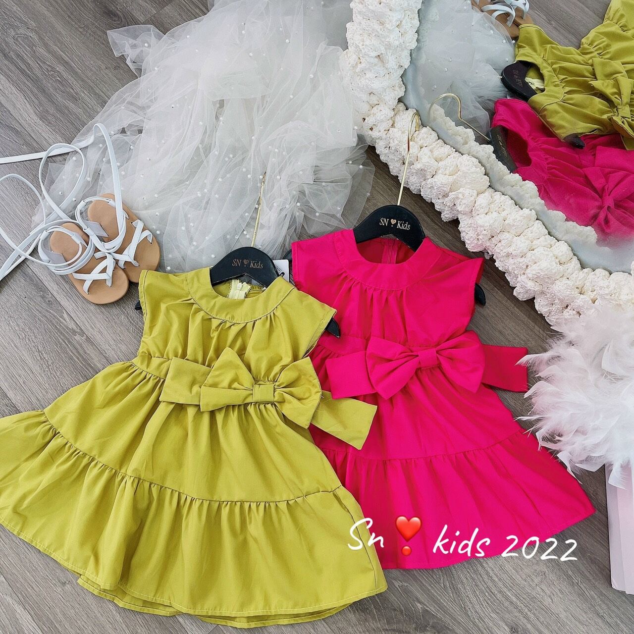 Váy thô mềm kèm nơ xinh cho bé gái