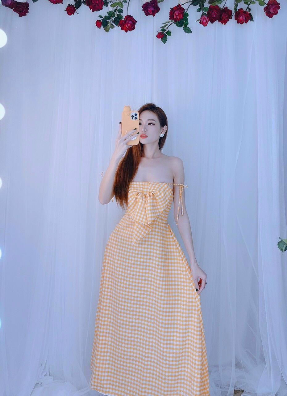 Đầm hai dây caro cột vai có nơ ngực chất vải lụa