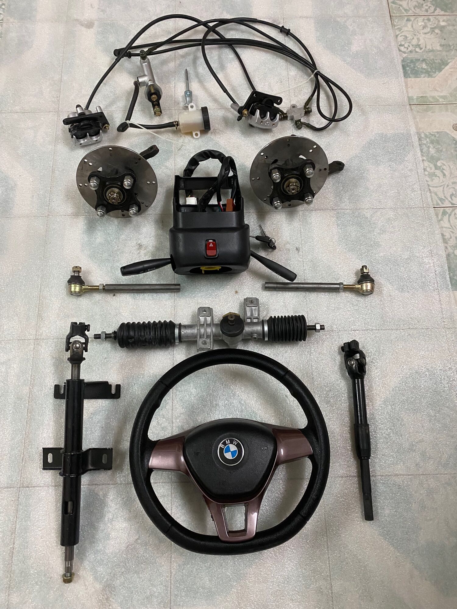 Bộ Hệ thống lái vô lăng phanh đĩa dầu cho xe 4 bánh đầy đủ,mai ơ tim ốc đo vuông 7cm,chéo 10cm