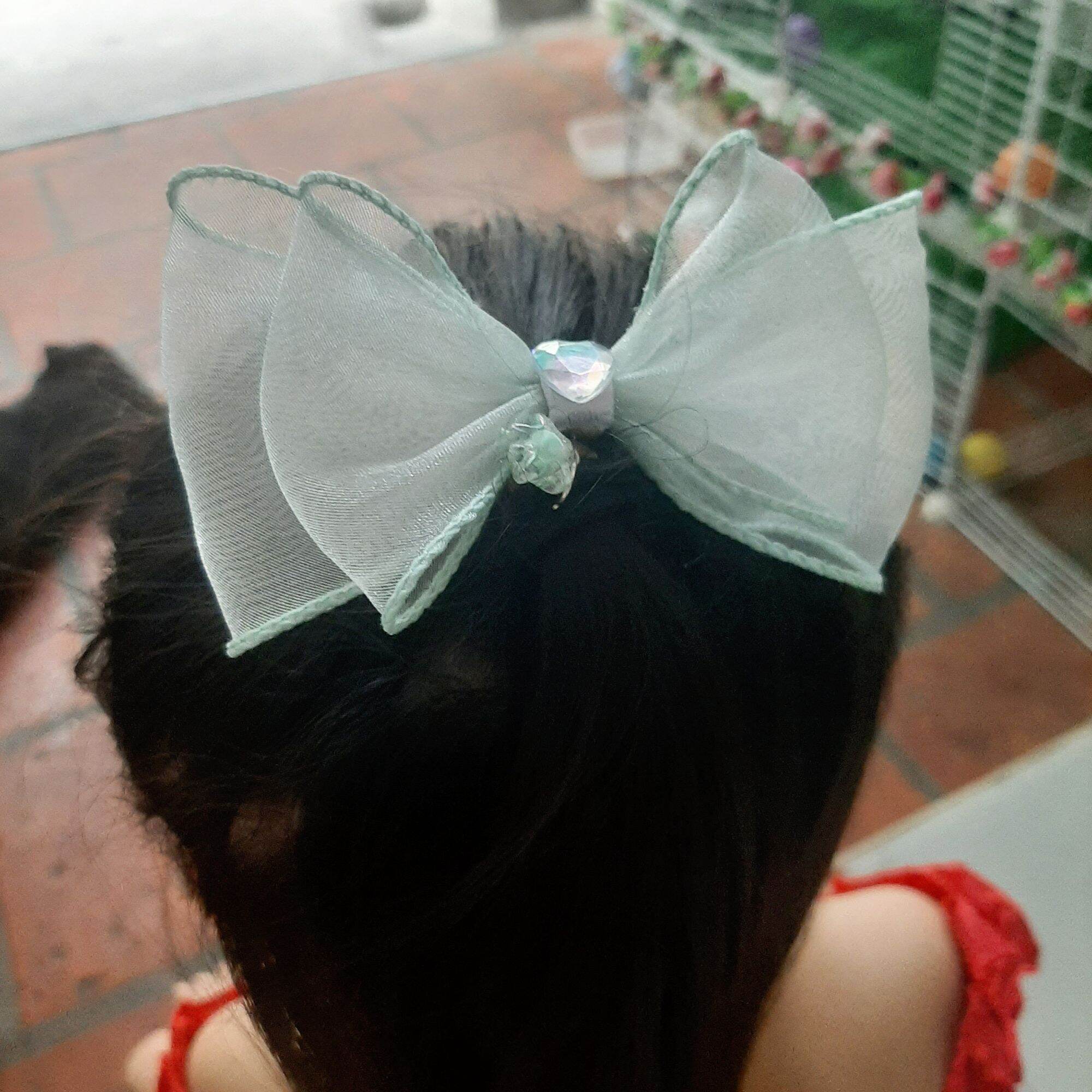 Cột tóc nơ voan đính sao