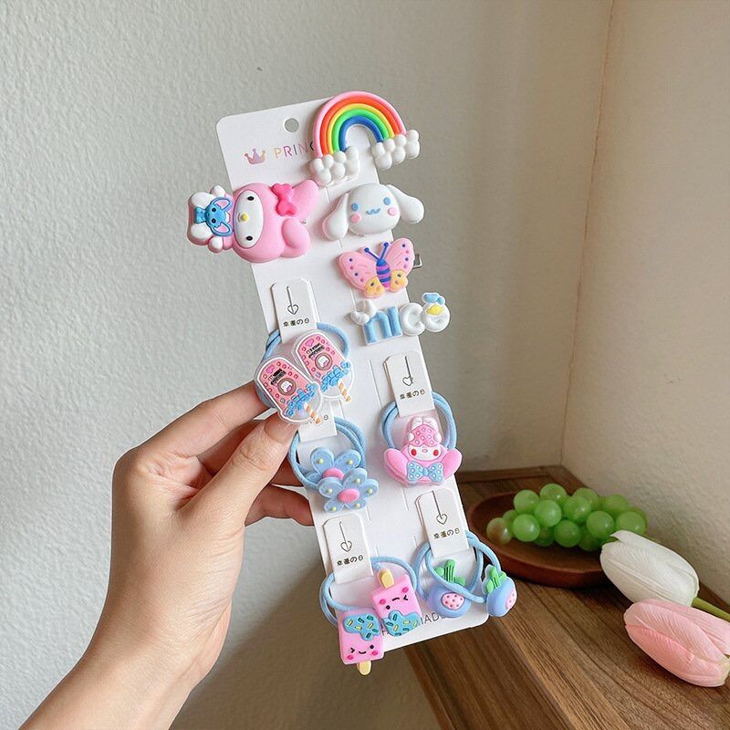 Vỉ 15 buộc tóc kèm cột tóc cho bé