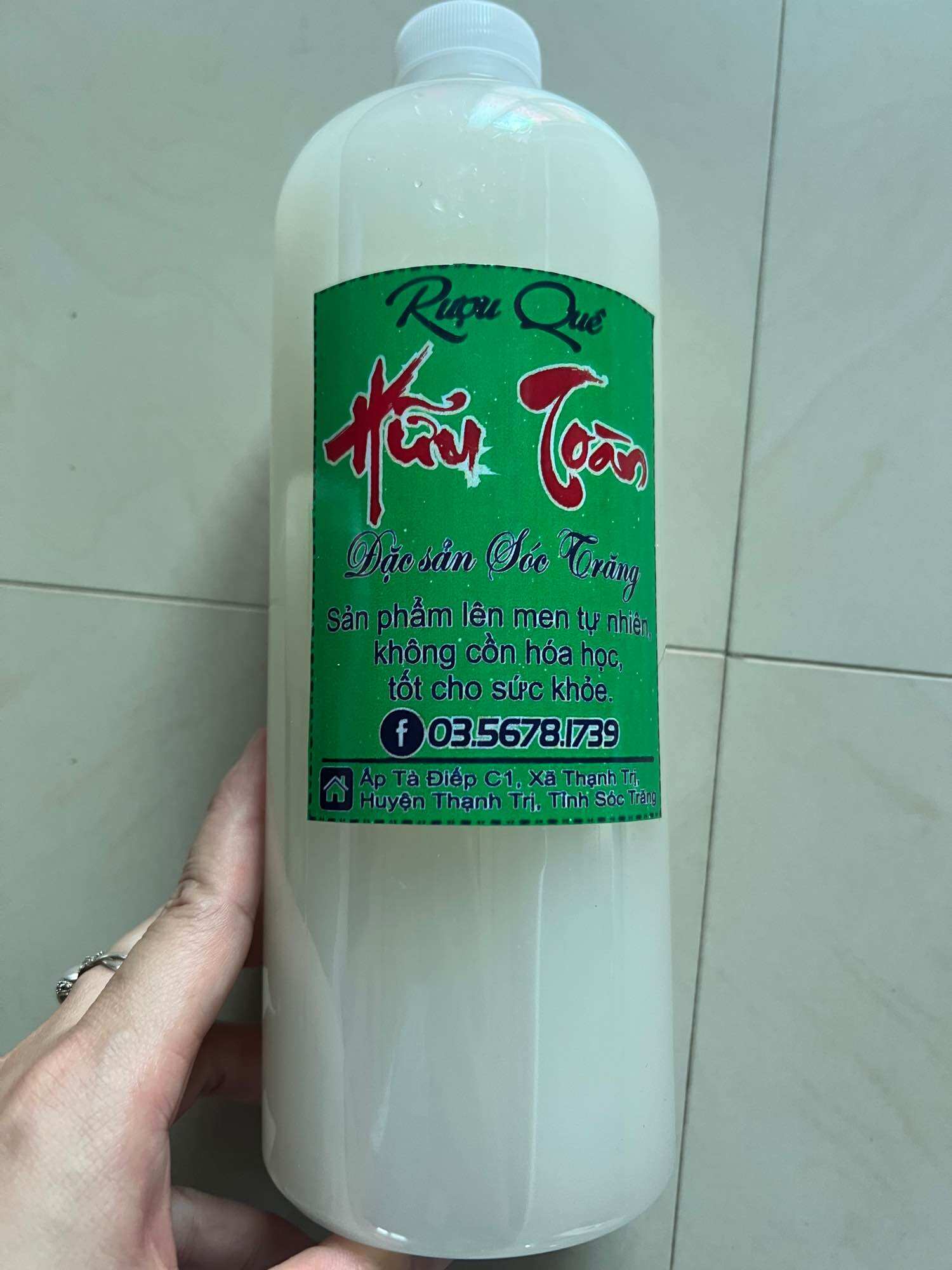 Rượu nếp sữa nhà làm, chai 1 lít 50k
