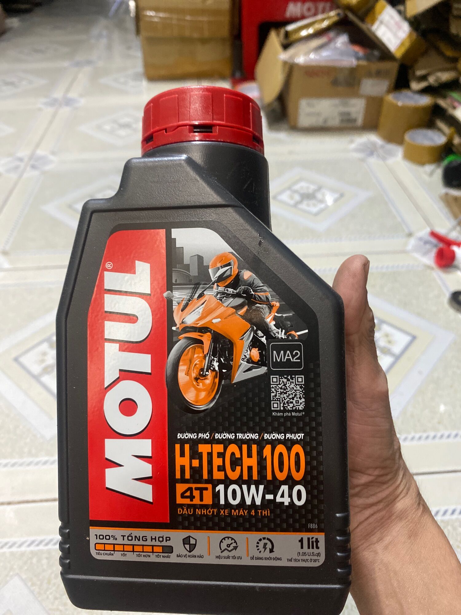 Chai 1 lít nhớt motul h-tech 10 full tổng họp 10w-40