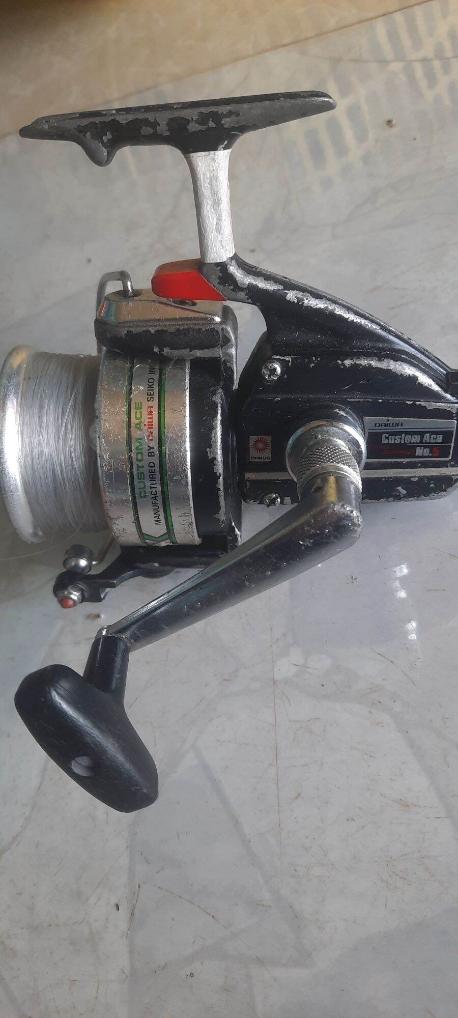 Máy câu cá hàng nhật bãi daiwa