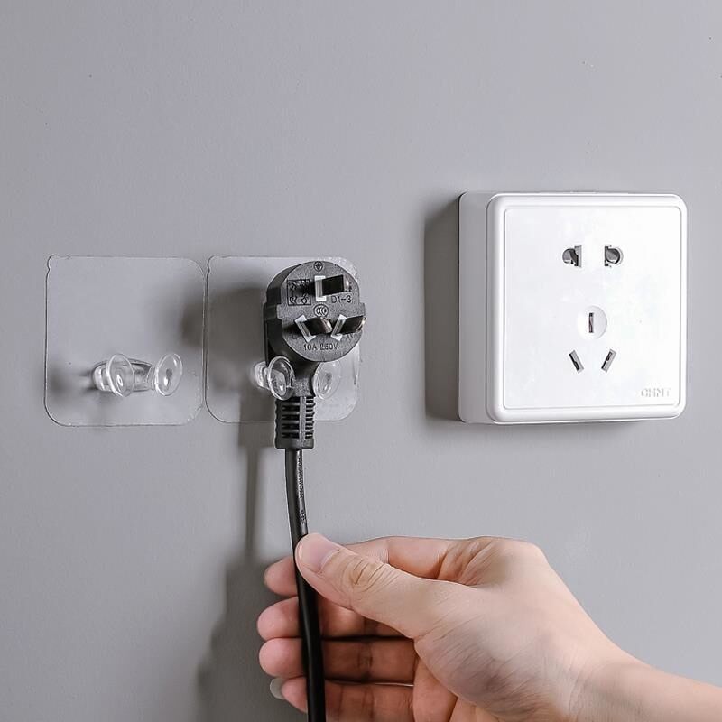 Móc dán tường treo phích cấm điện trong suốt