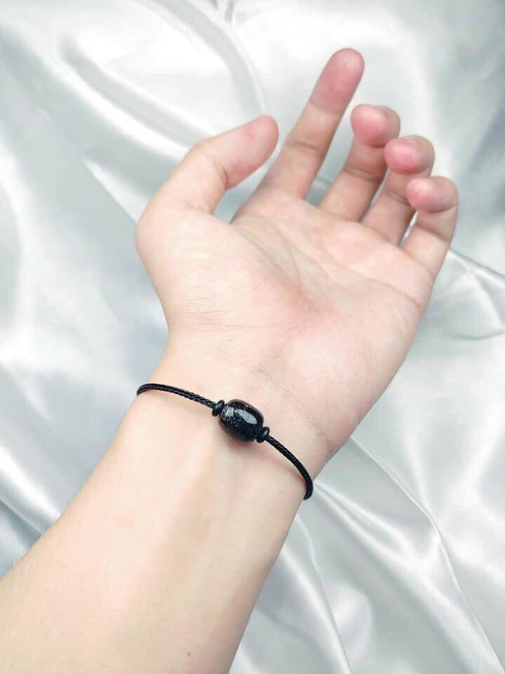 Vòng tay lu thống tóc đen