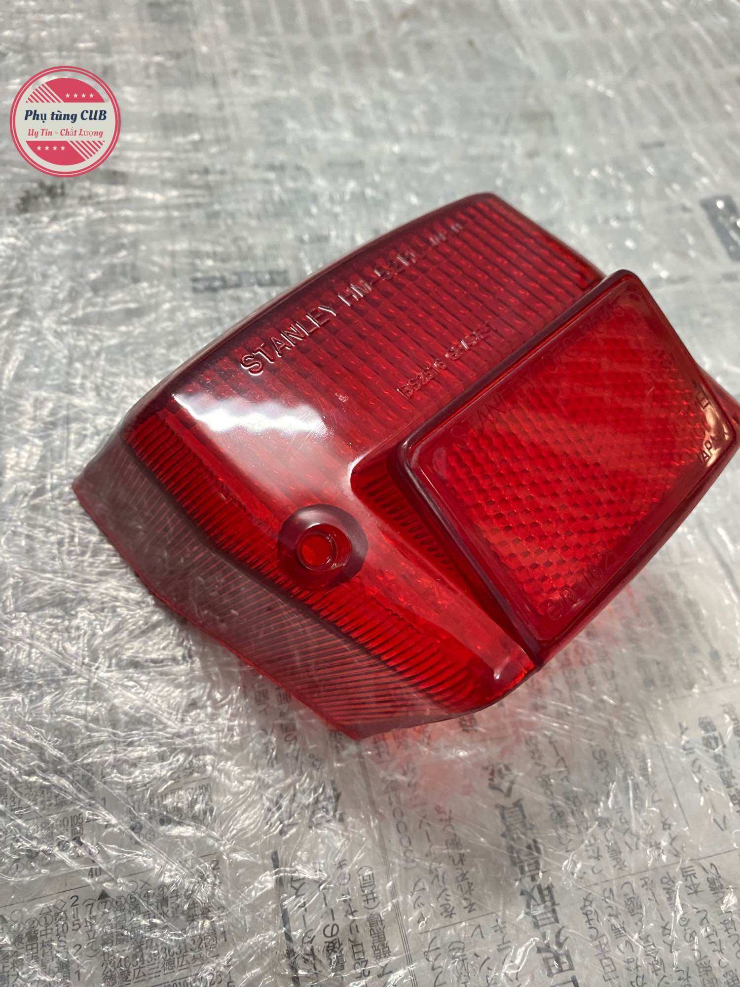 Chụp đèn hậu xe cub 82-84-DD hàng Thái ( có đóng Japan như zin )