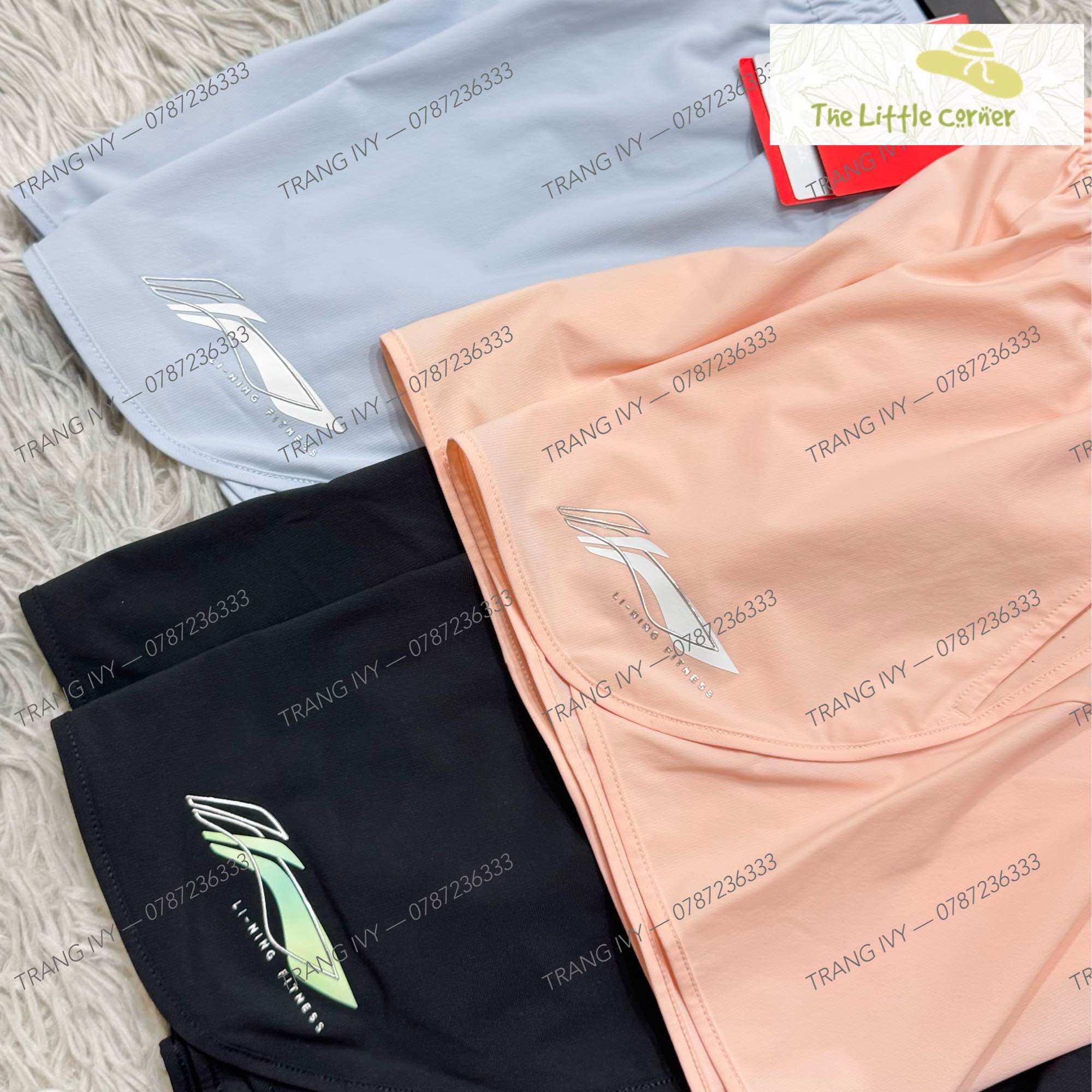 Quần short gió nữ Lining AKST754