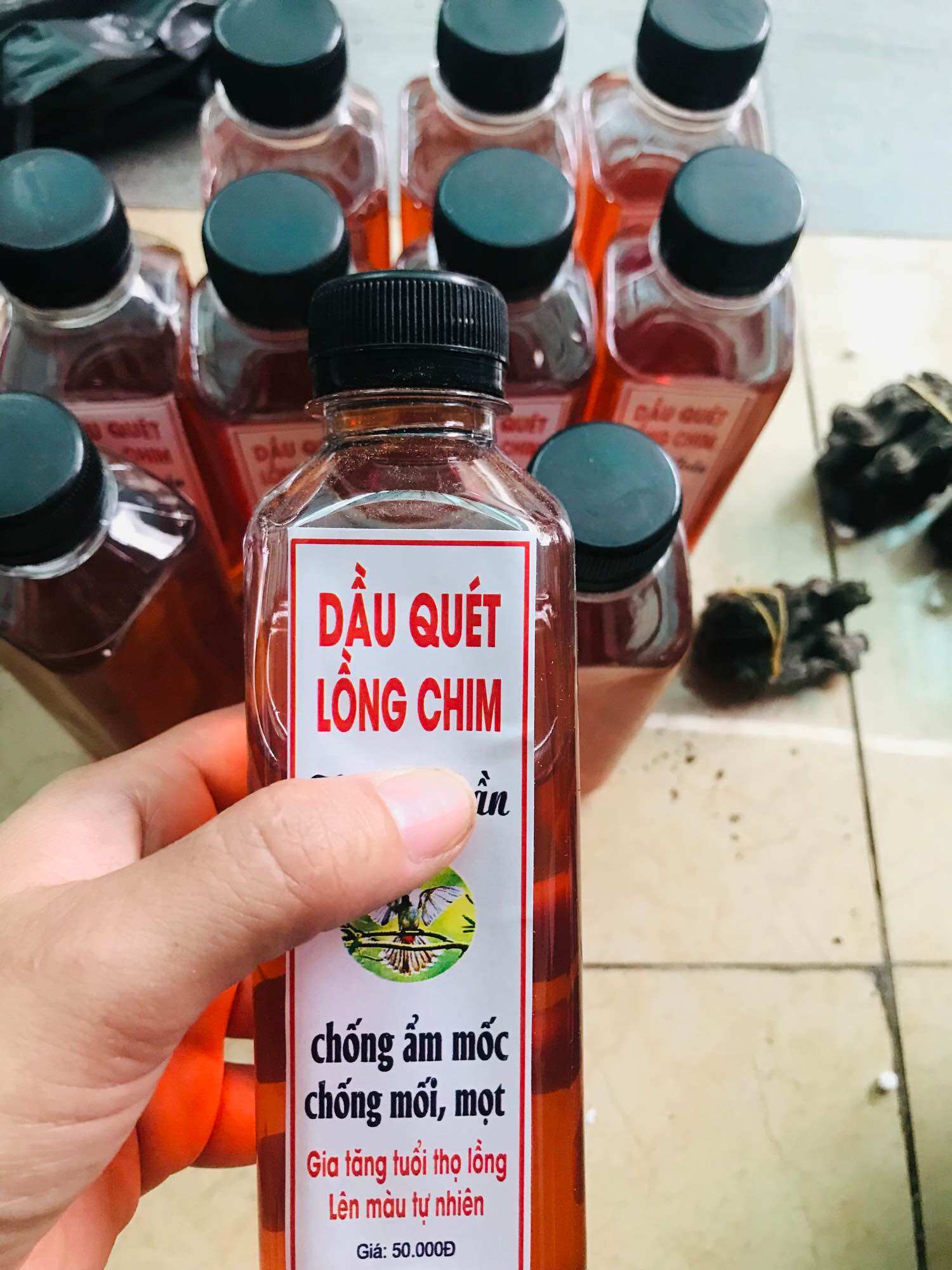Dầu quét lồng chim