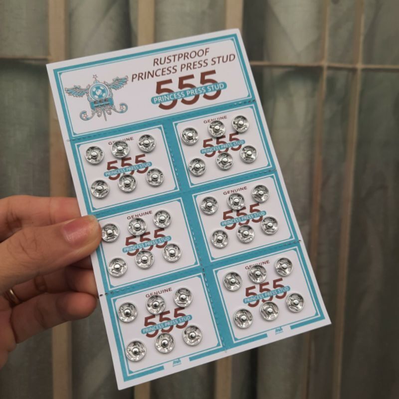Vỉ nút bấm áo dài,áo bé