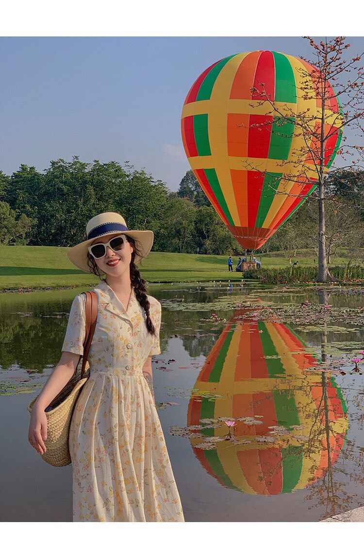 Đầm nữ hoa vàng chân dập ly cổ vest