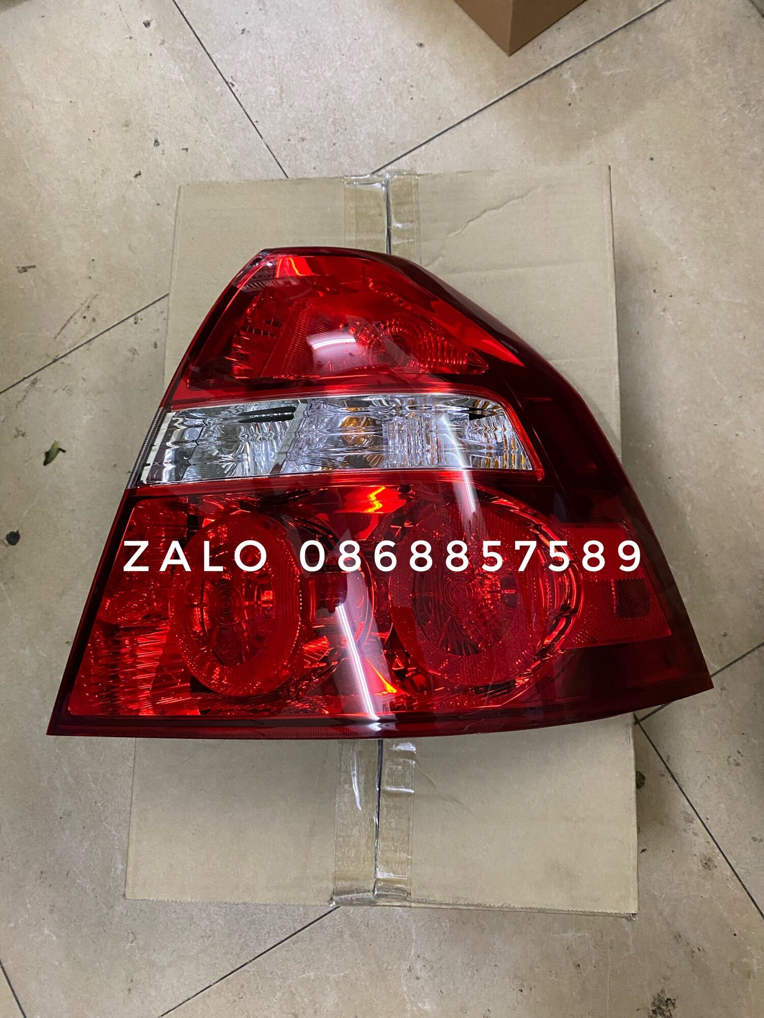 Đèn hậu aveo,gentra hàng gm:96650615
