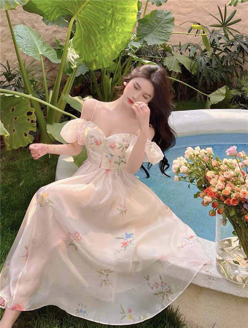 ĐẦM MAXI TRẮNG NỀN HOA 2S RỚT VAI CÚP NGỰC