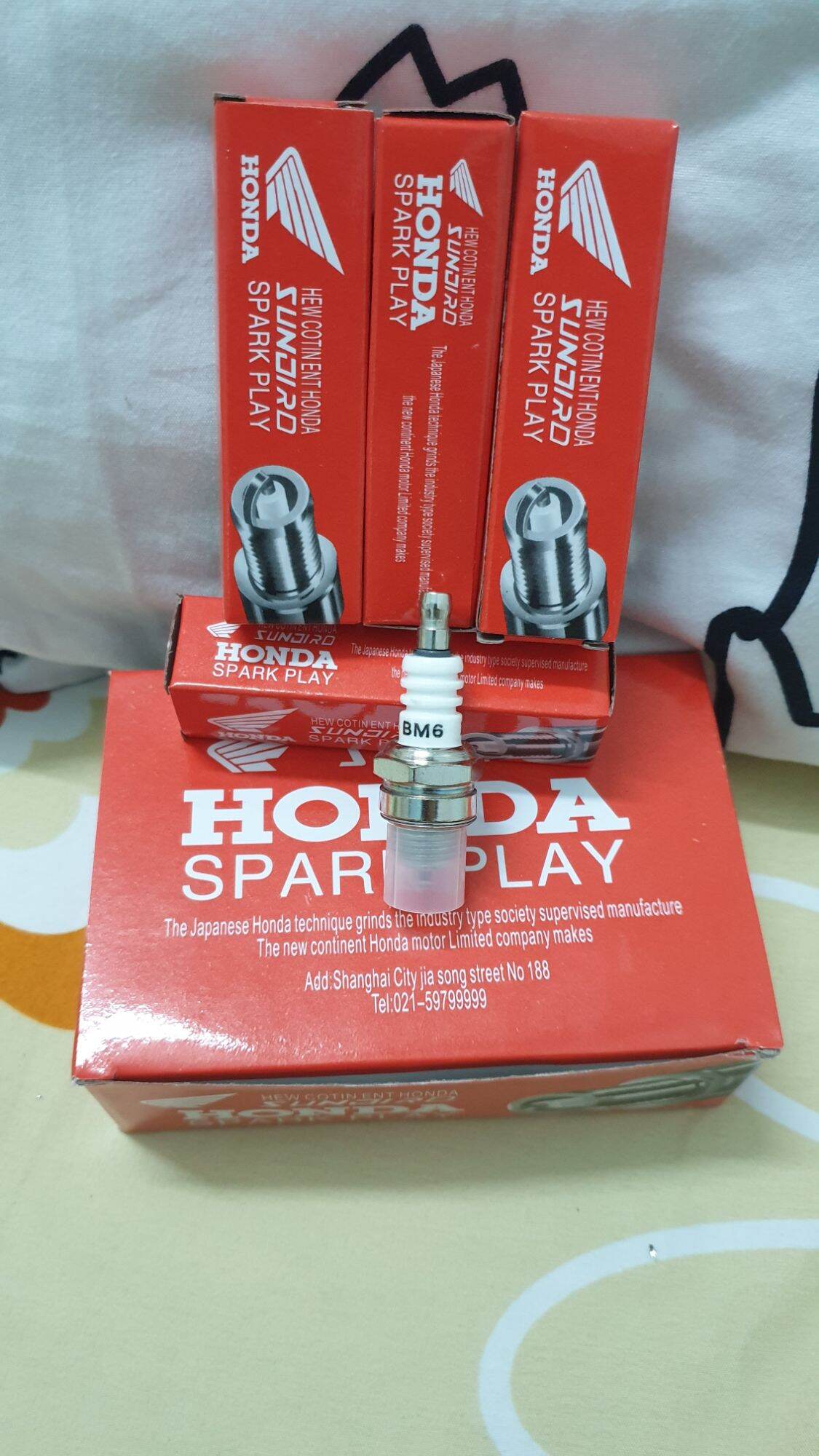 [HCM]Bugi máy cắt cỏ 2 thì ( đỏ)