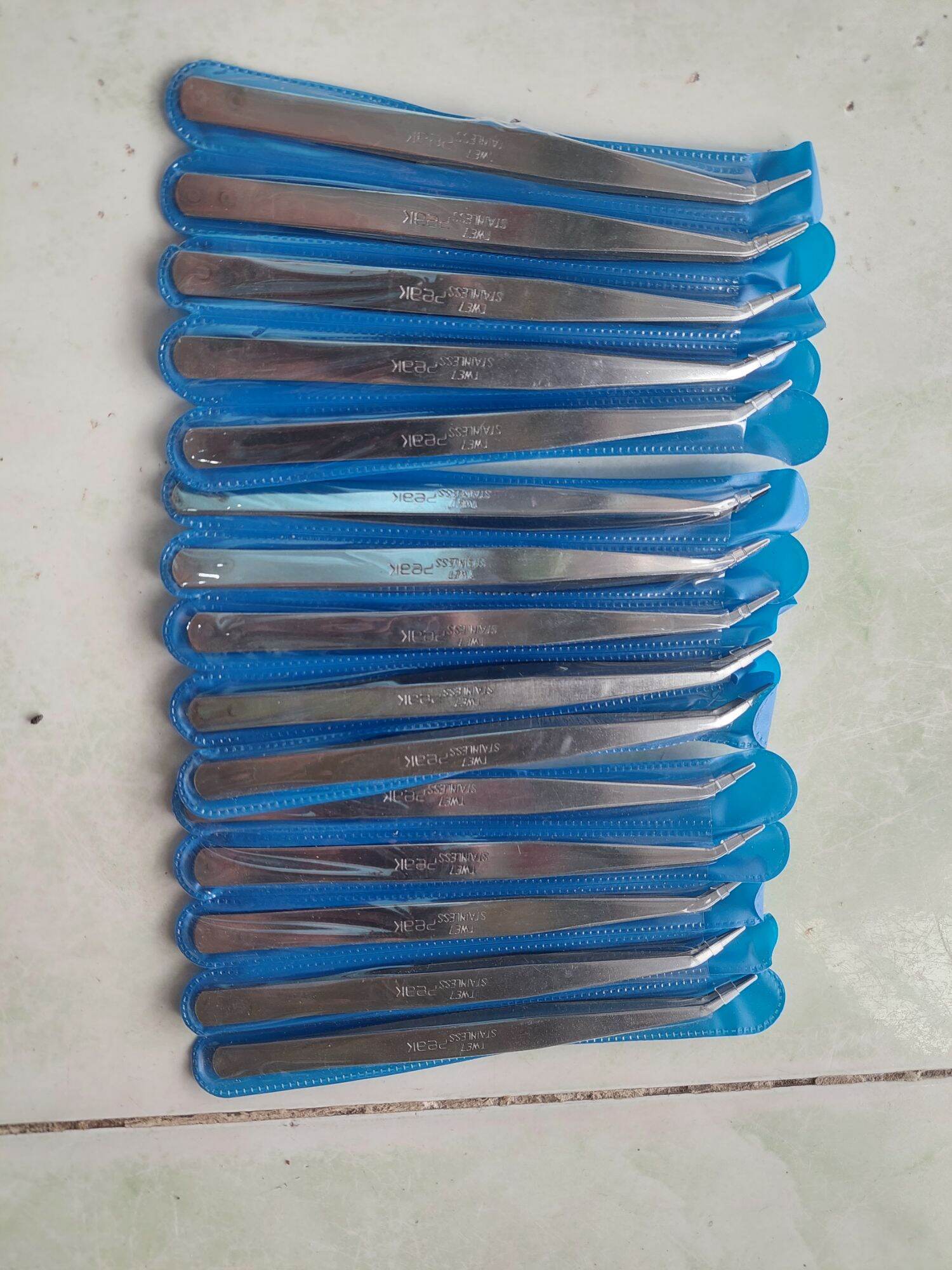 nhíp cong gắp chỉ cao cấp