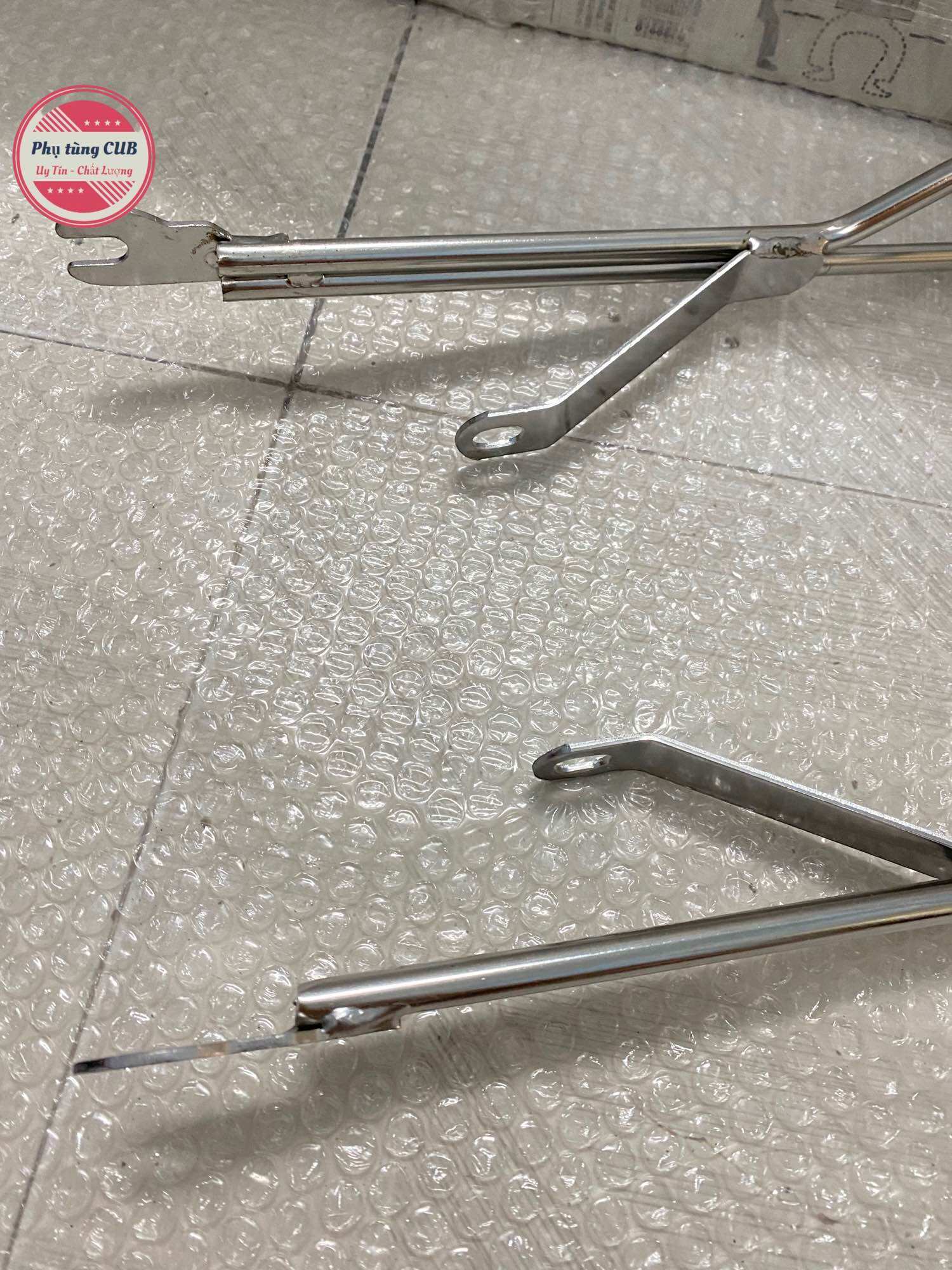 Baga đuôi có tay xách cho xe cub ( chất liệu inox )