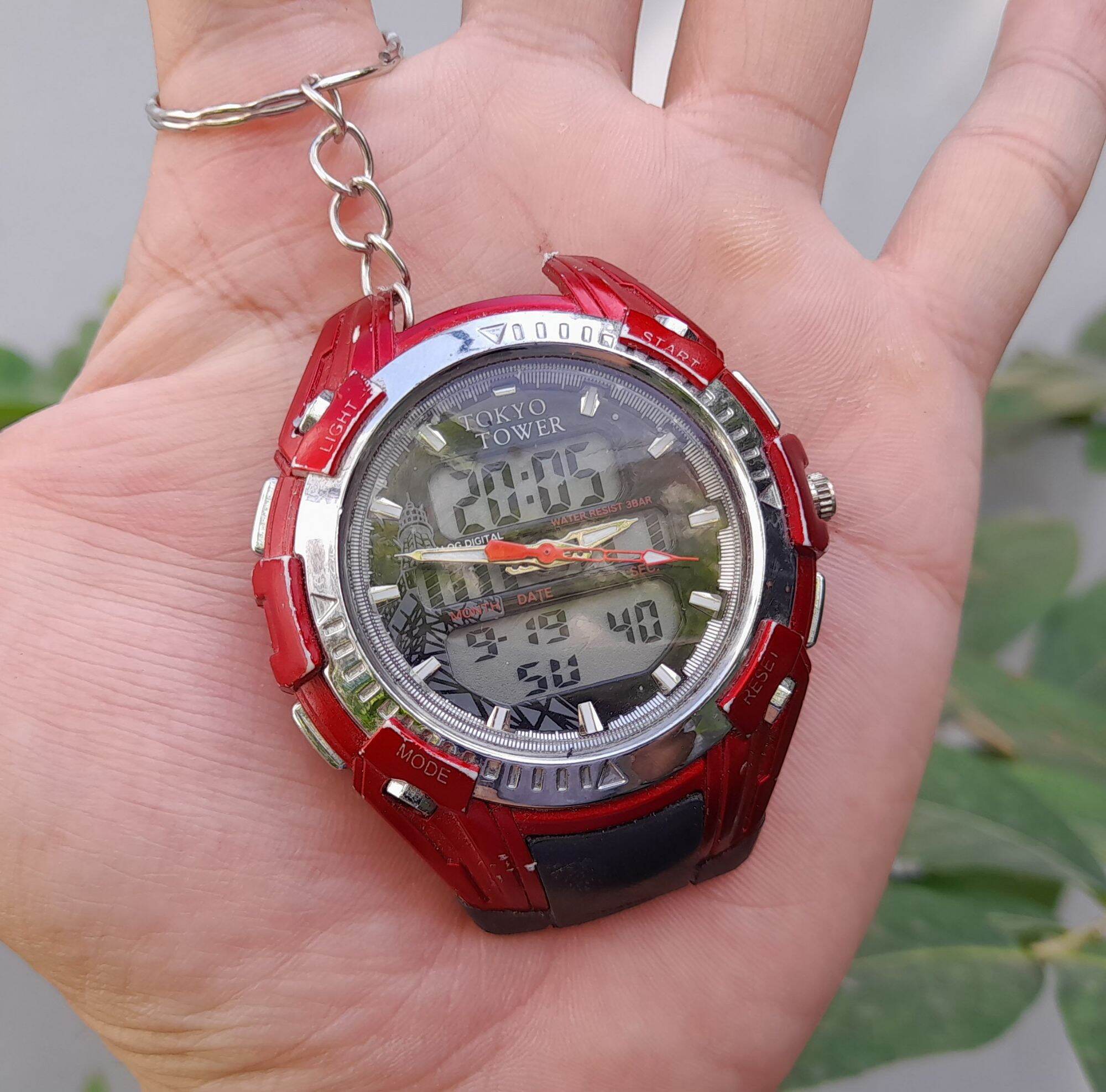 Đồng hồ móc khóa 2 máy độc lạ