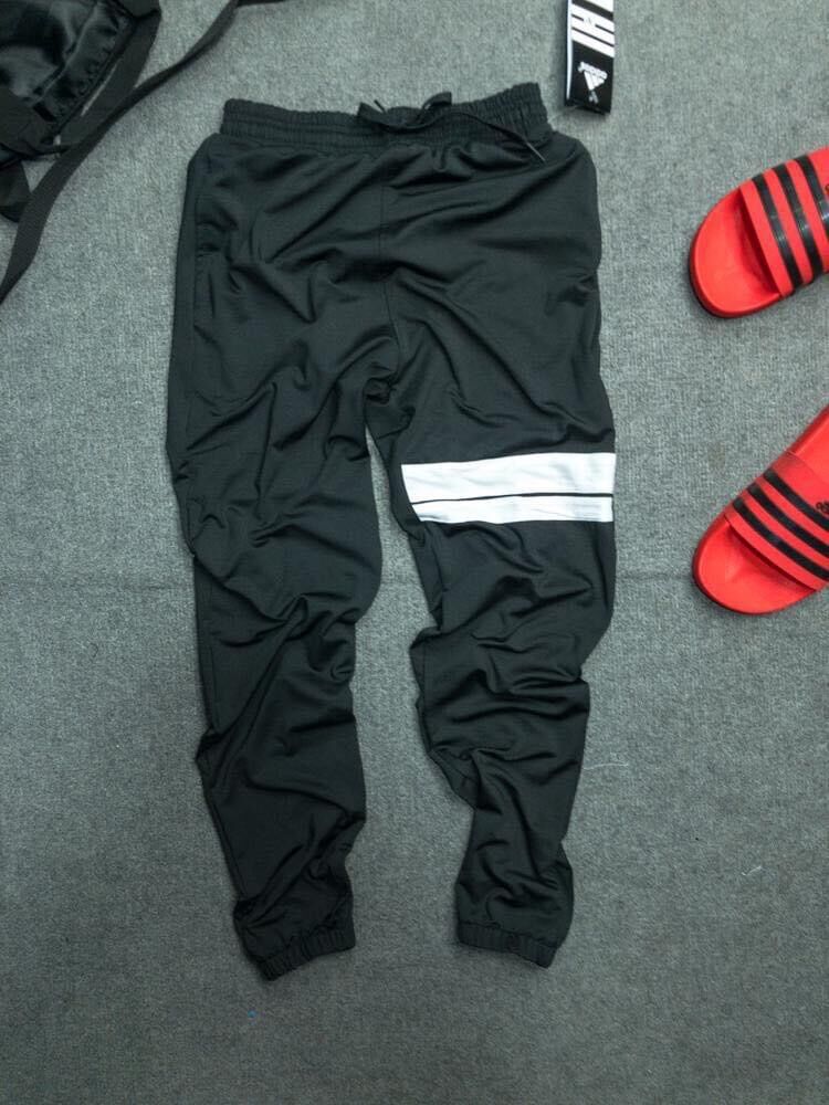 Quần jogger Unisex 2 sọc ống túm