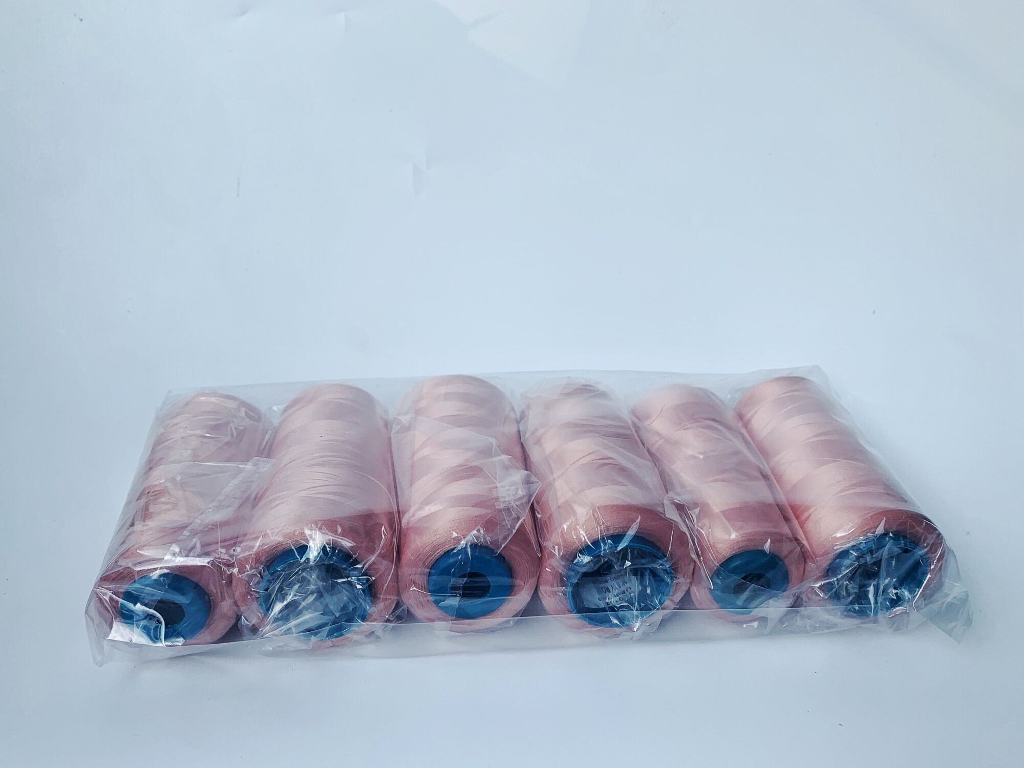 VỈ 6 CUỘN CHỈ TƠ VẮT SỔ MÀU HỒNG ĐẤT 5000M